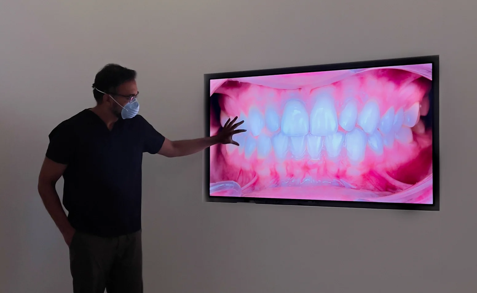 Dr Nilesh Amin working on a presentation